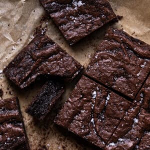 Almond flour brownies with a crackly top showing the fudgy center