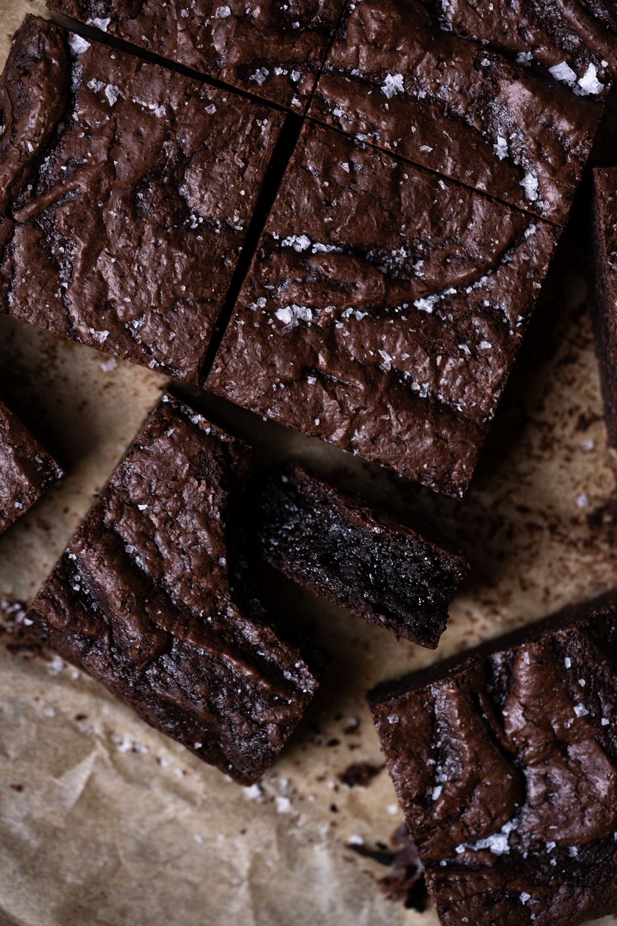 Almond flour brownies with a crackly top showing the fudgy center