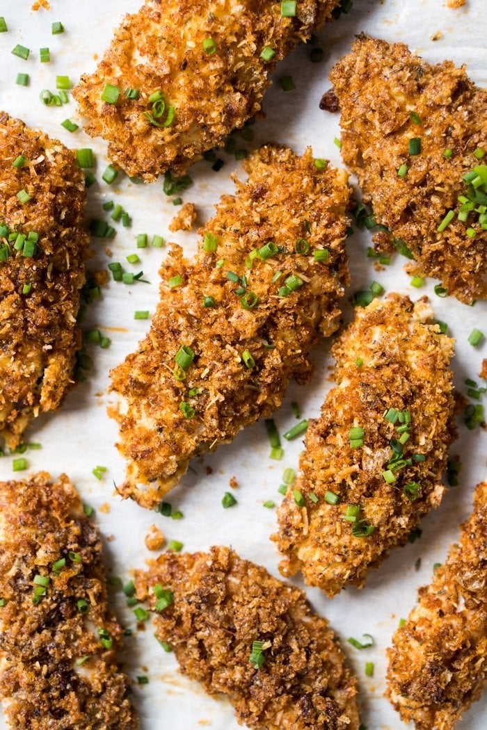 Freshly baked keto chicken tenders with chives