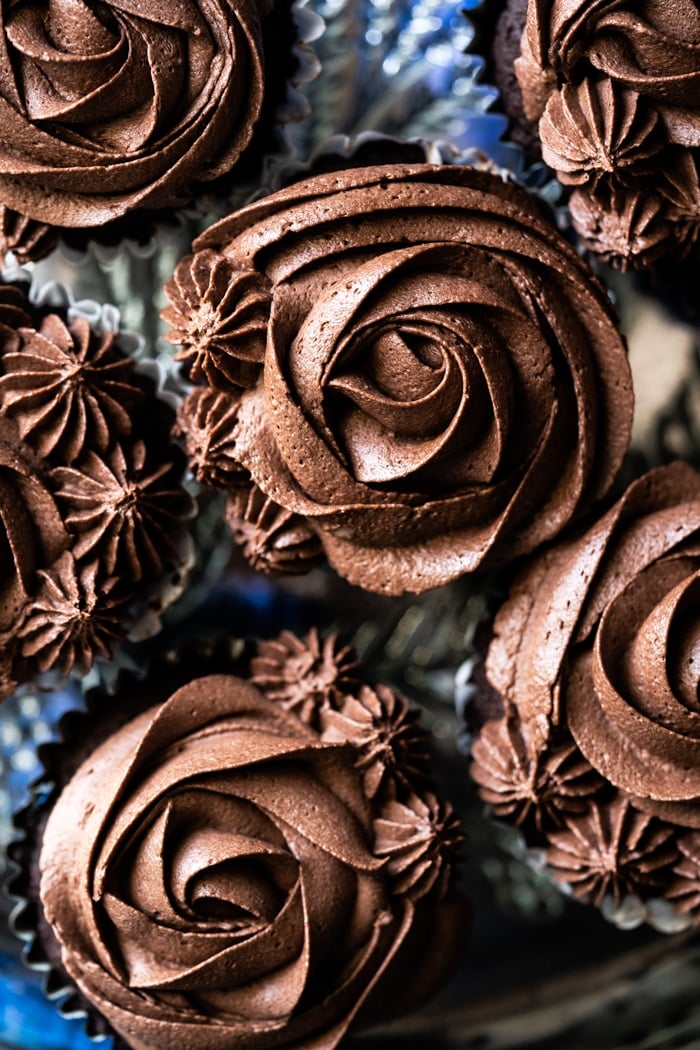 Closeup chocolate buttercream frosting piped as flowers