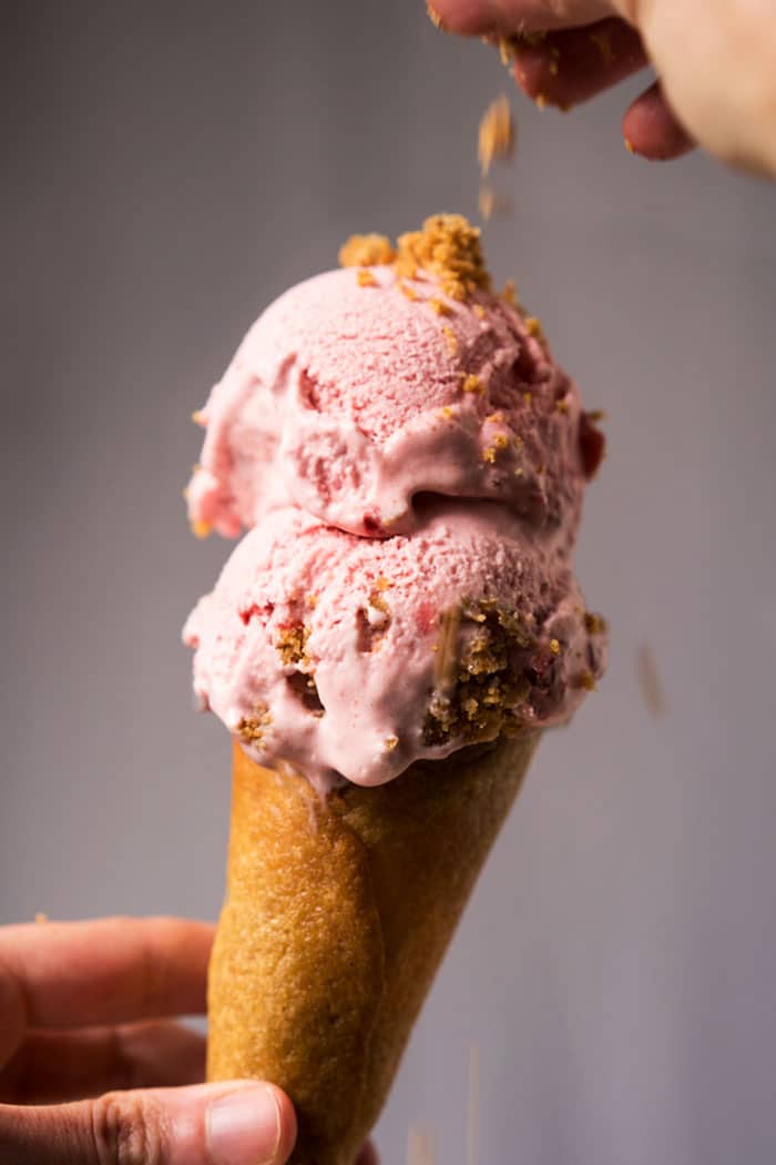 Keto strawberry cheesecake ice cream with an ice cream cone