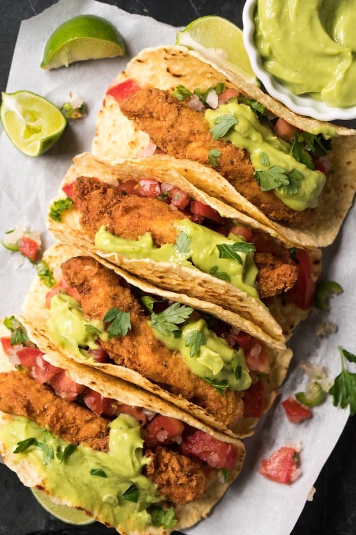 Overhead of crisp fried fish tacos with keto tortillas