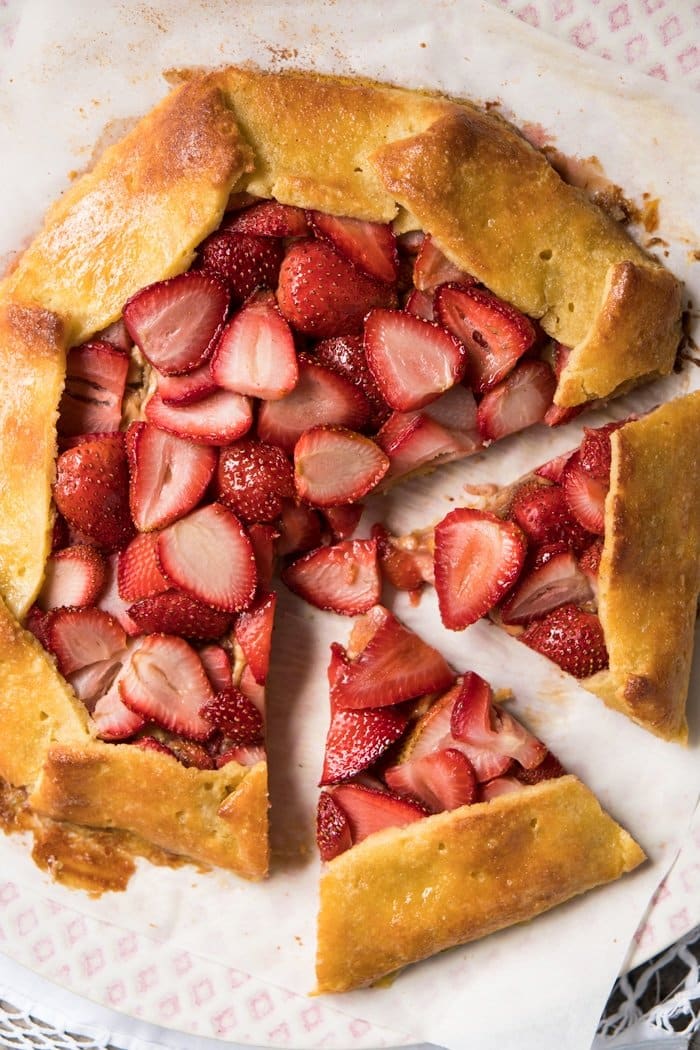 Sliced up keto strawberry galette with pie crust