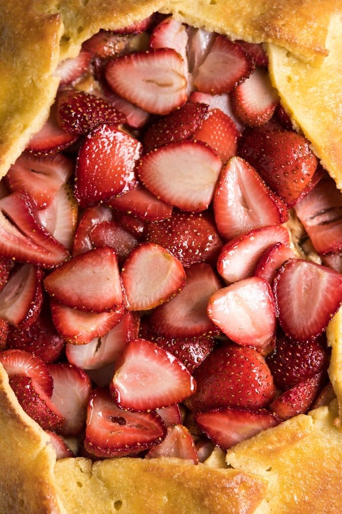 Closeup sliced strawberries in a keto galette