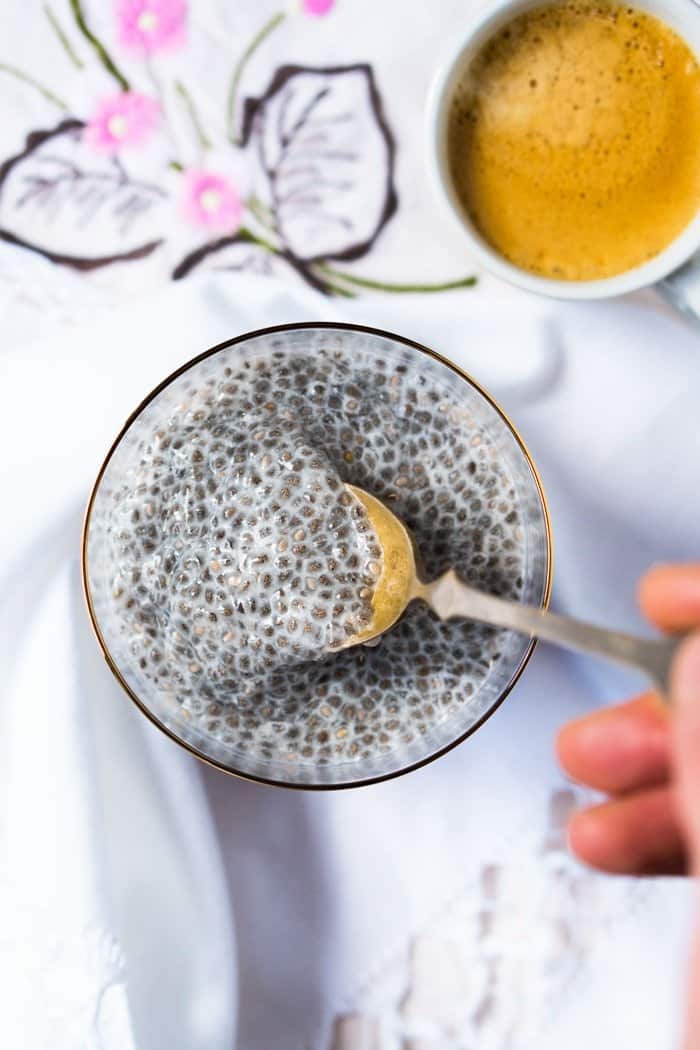 Taking a spoonful of overnight Keto chia pudding