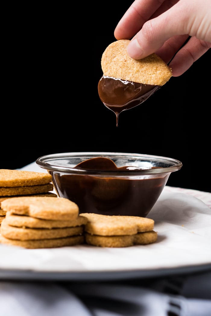 Dunking Keto Shortbread Cookies in Chocolate