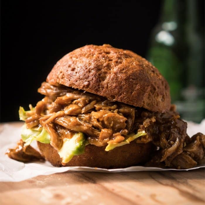 Keto BBQ Pulled Pork with coleslaw in a burger bun