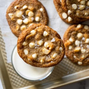 Keto white chocolate macadamia nut cookies with a glass of milk