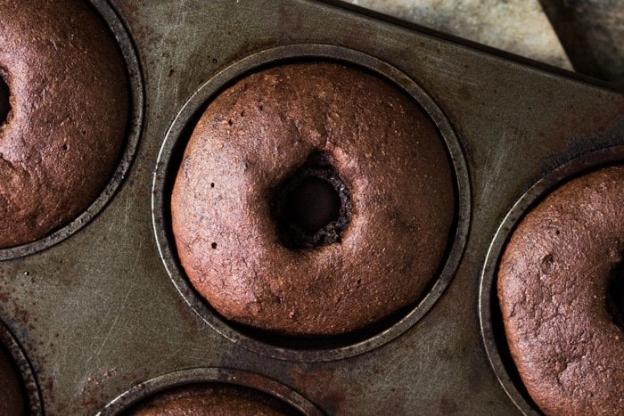 Freshly baked keto chocolate donut in pan