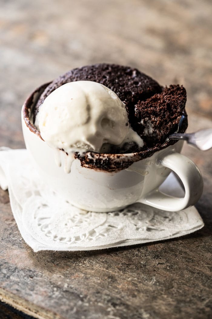 Chocolate keto mug cake with vanilla ice cream
