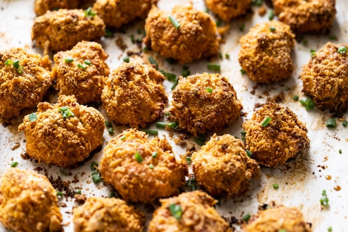 Freshly baked keto popcorn chicken with chives