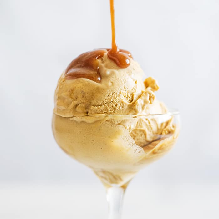 Keto salted caramel ice cream with a sugar free caramel drizzle