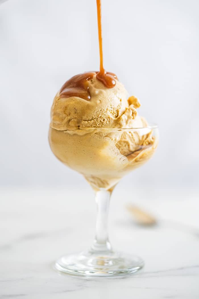 Keto salted caramel ice cream with a sugar free caramel drizzle