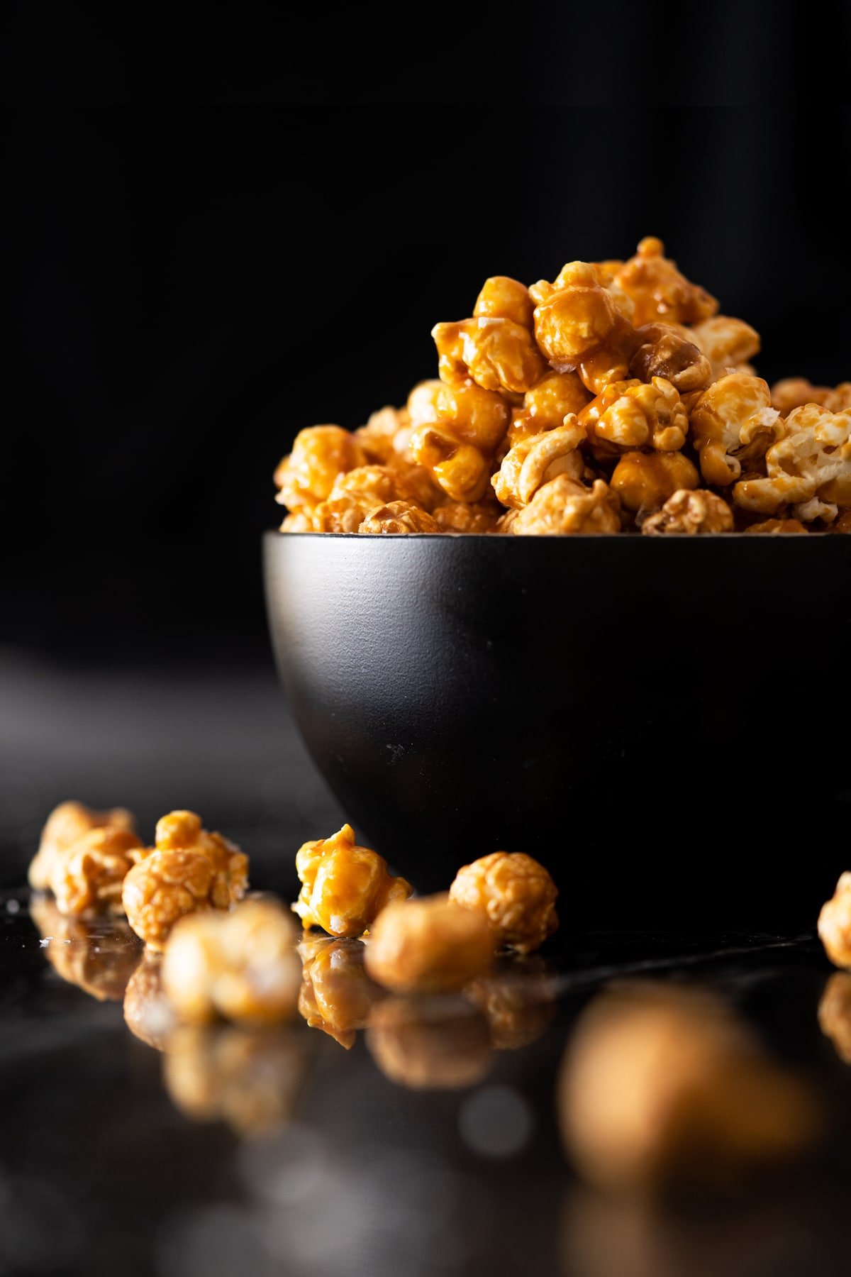 Overflowing bowl with low carb and sugar free caramel popcorn
